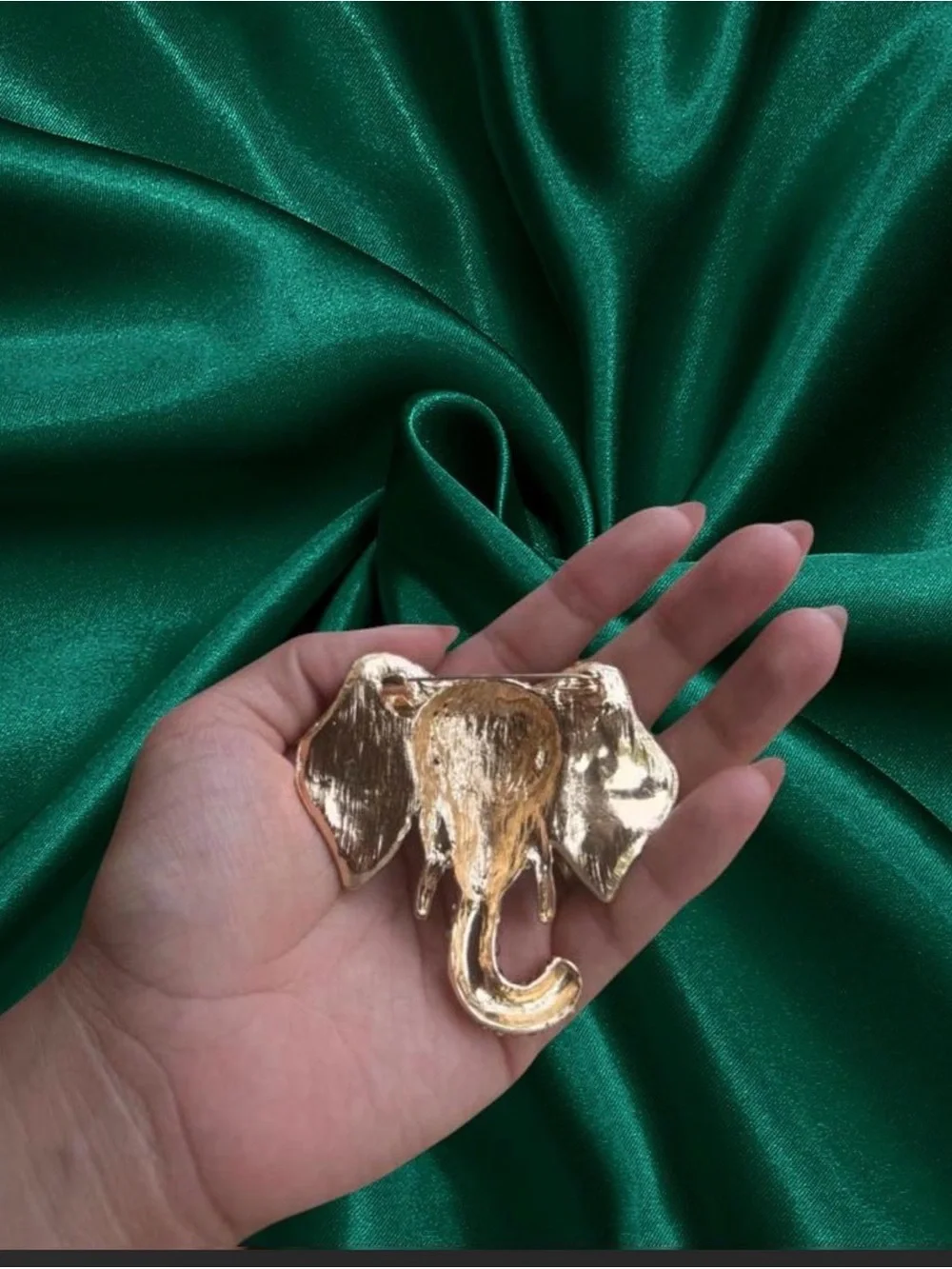 Gold-Tone Elephant Brooch with Green Eye Accents